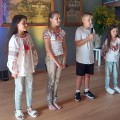 Anykščiuose gyvenančių ukrianiečių moksleivių pasirodymas.