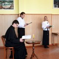 Poetinės kompozicijos skaitovai: kun. J. Jasėnas, A. Verbickas ir R. Poškuvienė.